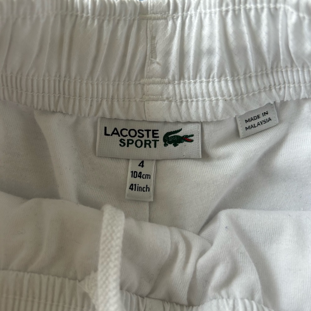 White Lacoste shorts size 4 boys